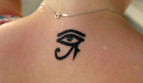 Attractive Black Ink Horus Eye Tattoo On Upperback